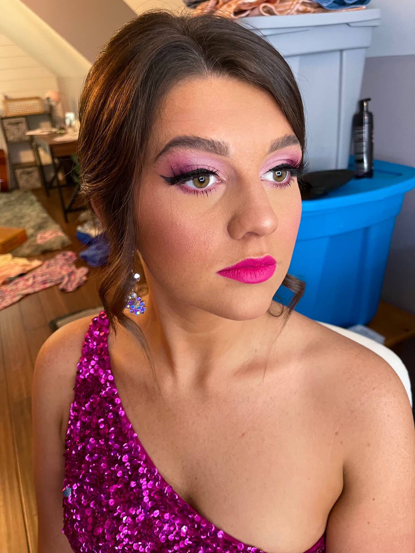 Prom glam with pink cut-crease eye, dramatic lashes and fuchsia lip