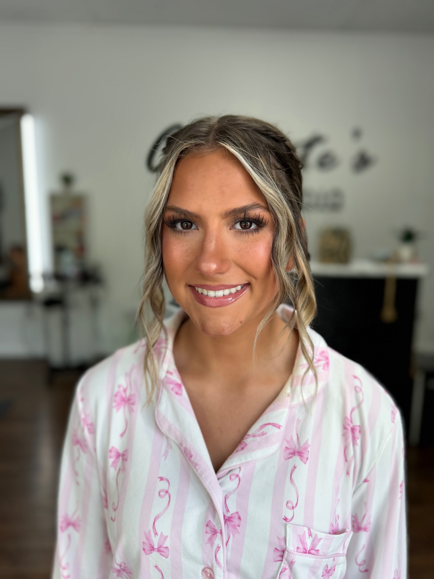 Fresh glowing makeup with soft bronze eye and glossy pink lip