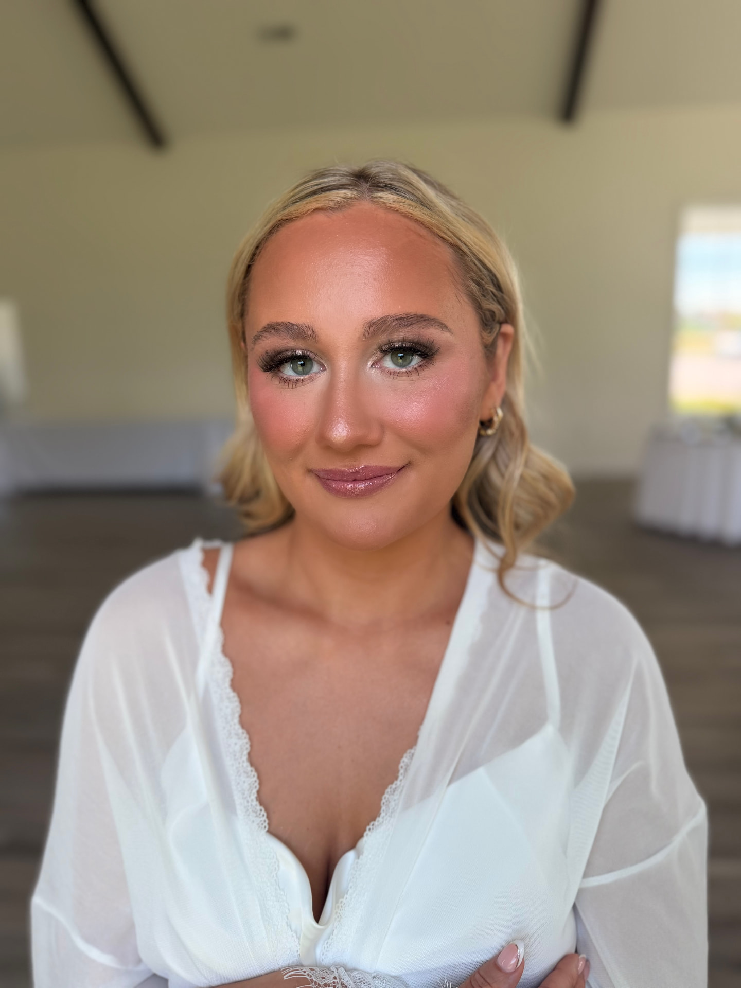 Dewy glowing skin with soft pink blush and lashes