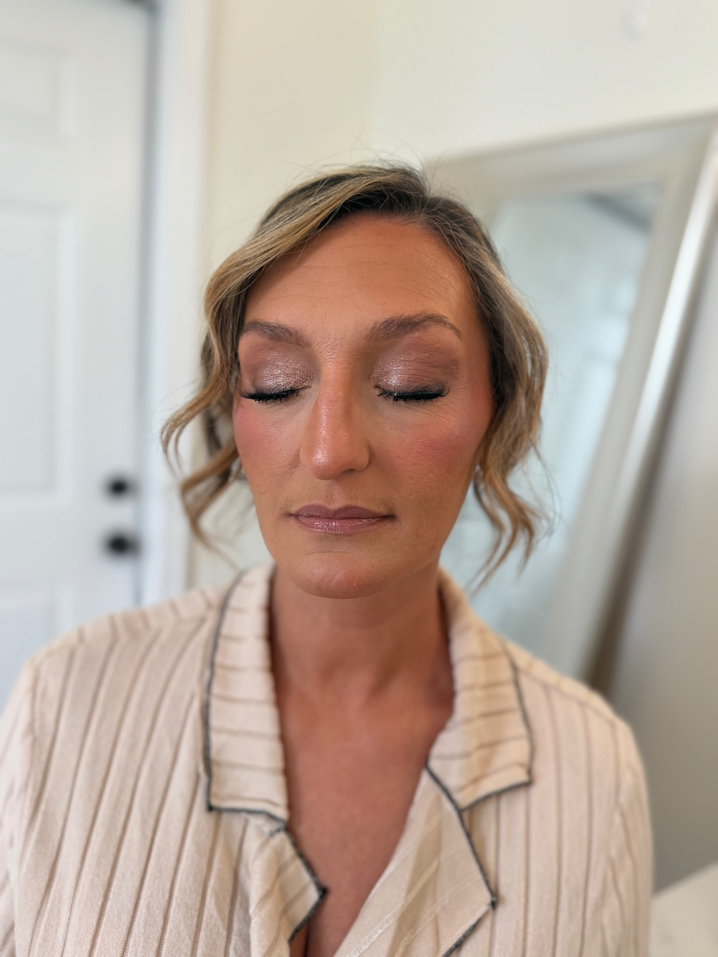Champagne shimmer eyeshadow with soft rose cheeks