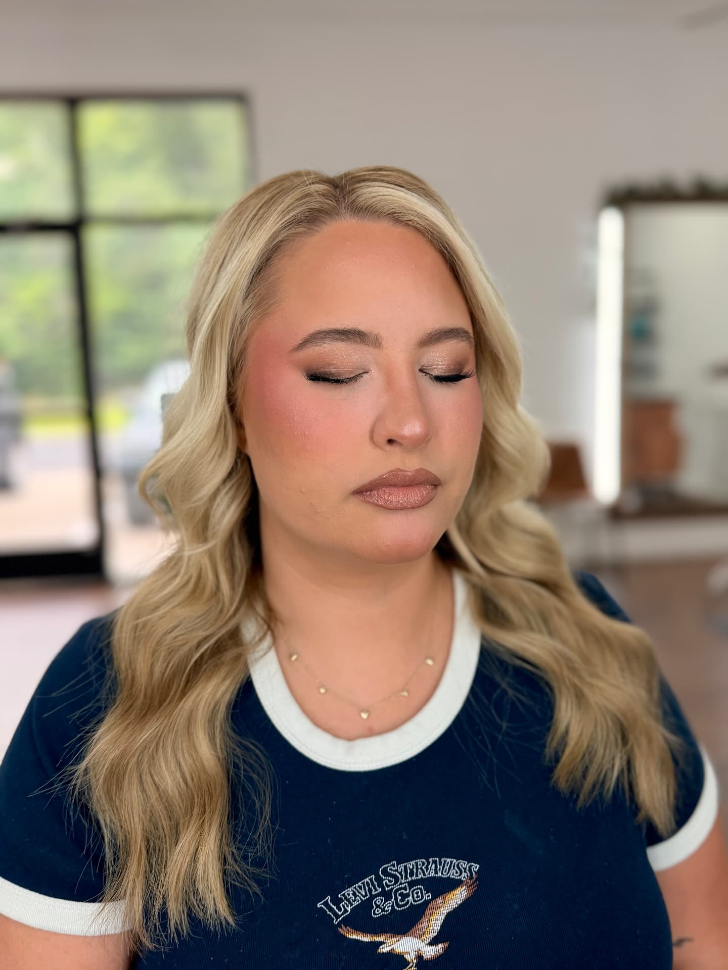 Warm bronze shimmer eye with sculpted blush and nude gloss