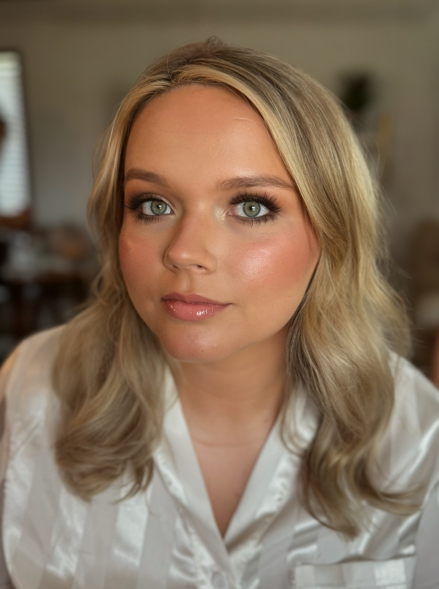 Soft glam with warm bronze eye, peach blush and glossy pink lip