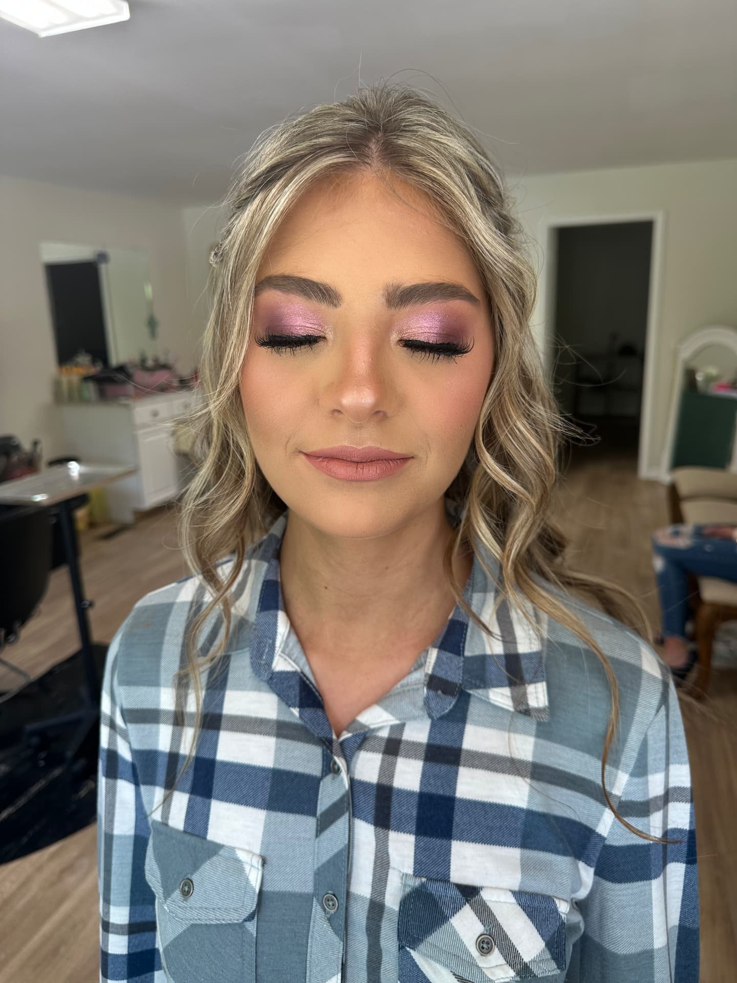 Pink and plum shimmer eyeshadow with soft glowing skin