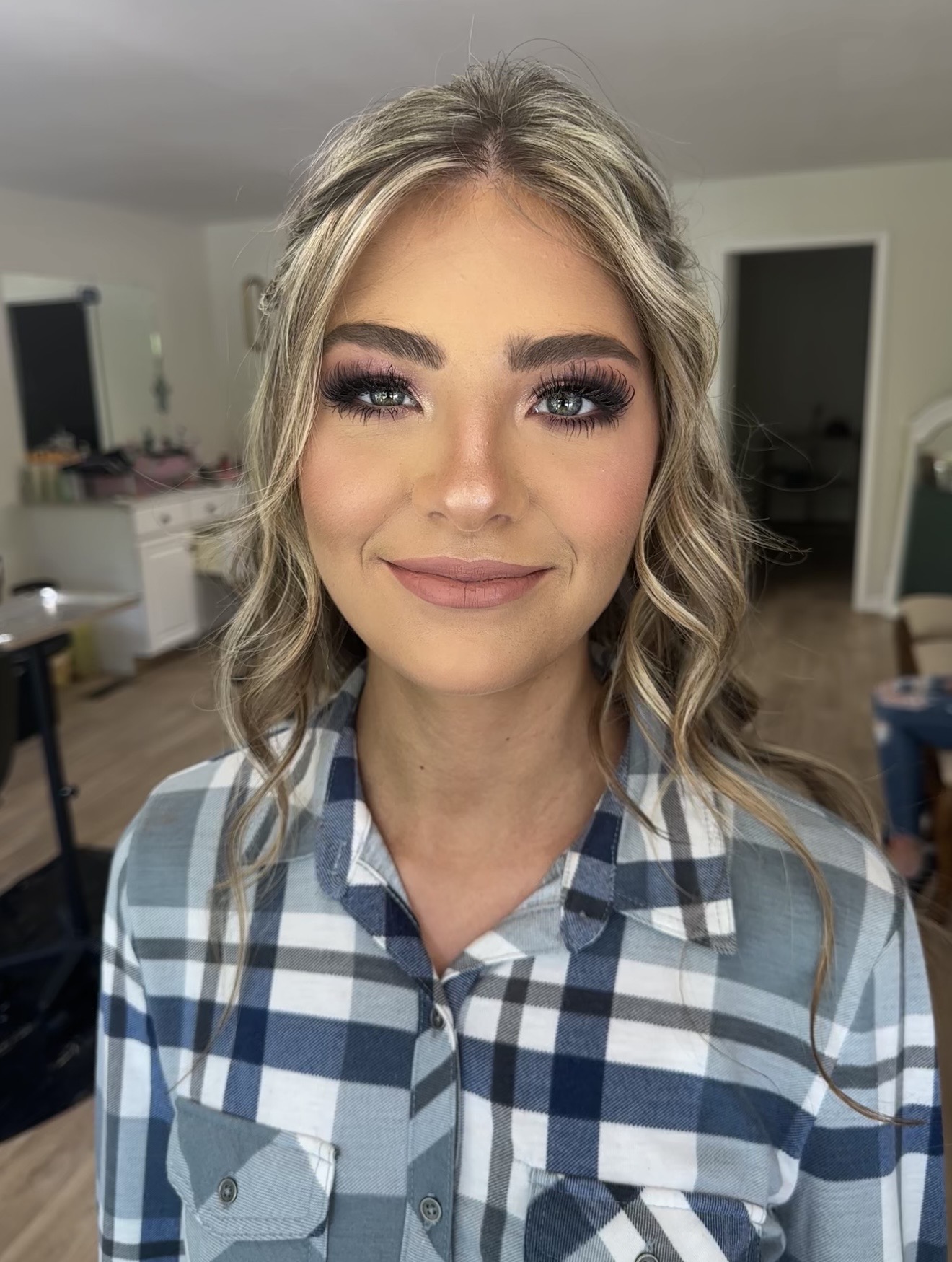 Mauve smoked eye with dramatic lashes and nude satin lip
