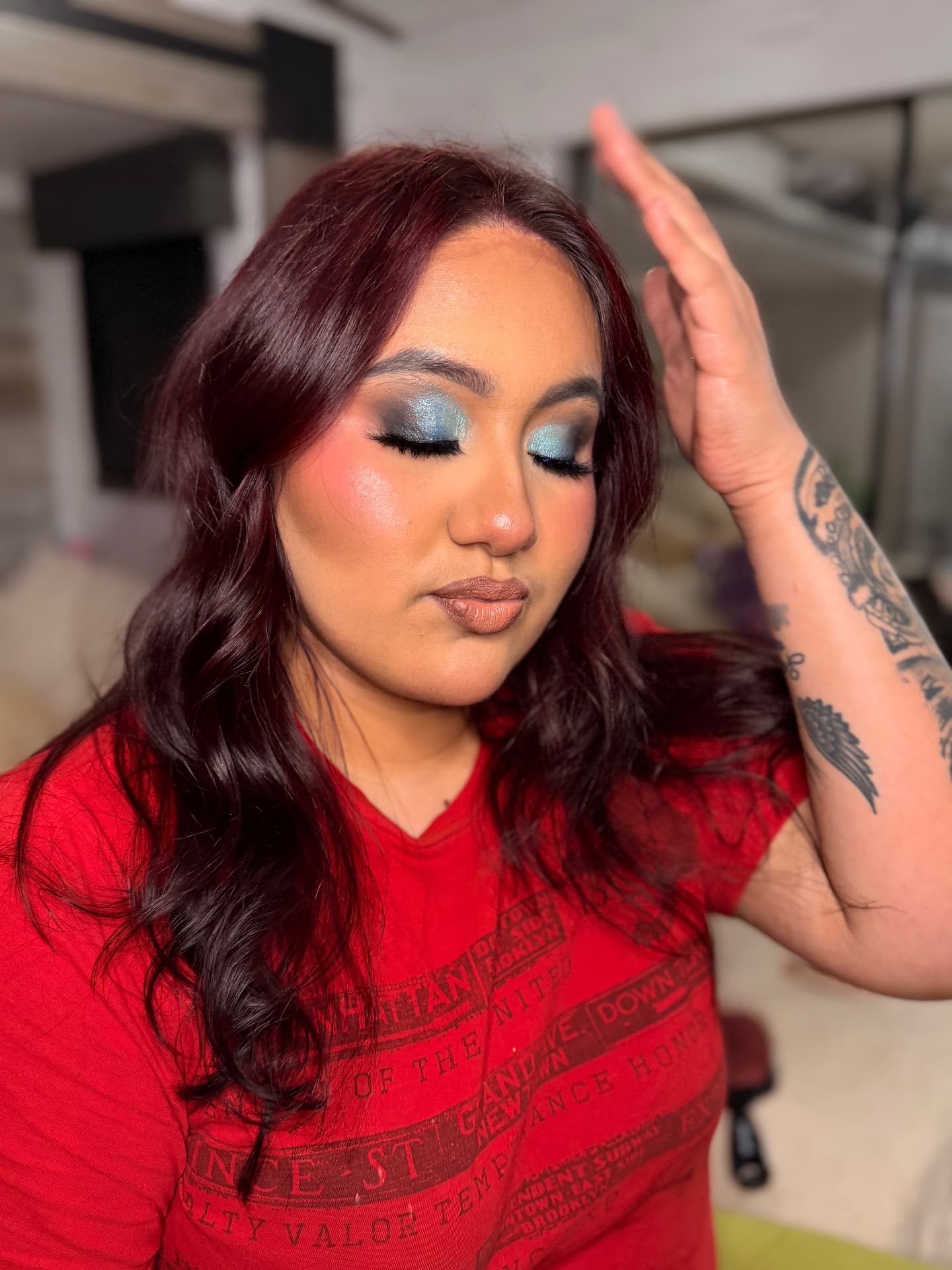 Vibrant blue smoked eye with glowing highlight and nude gloss