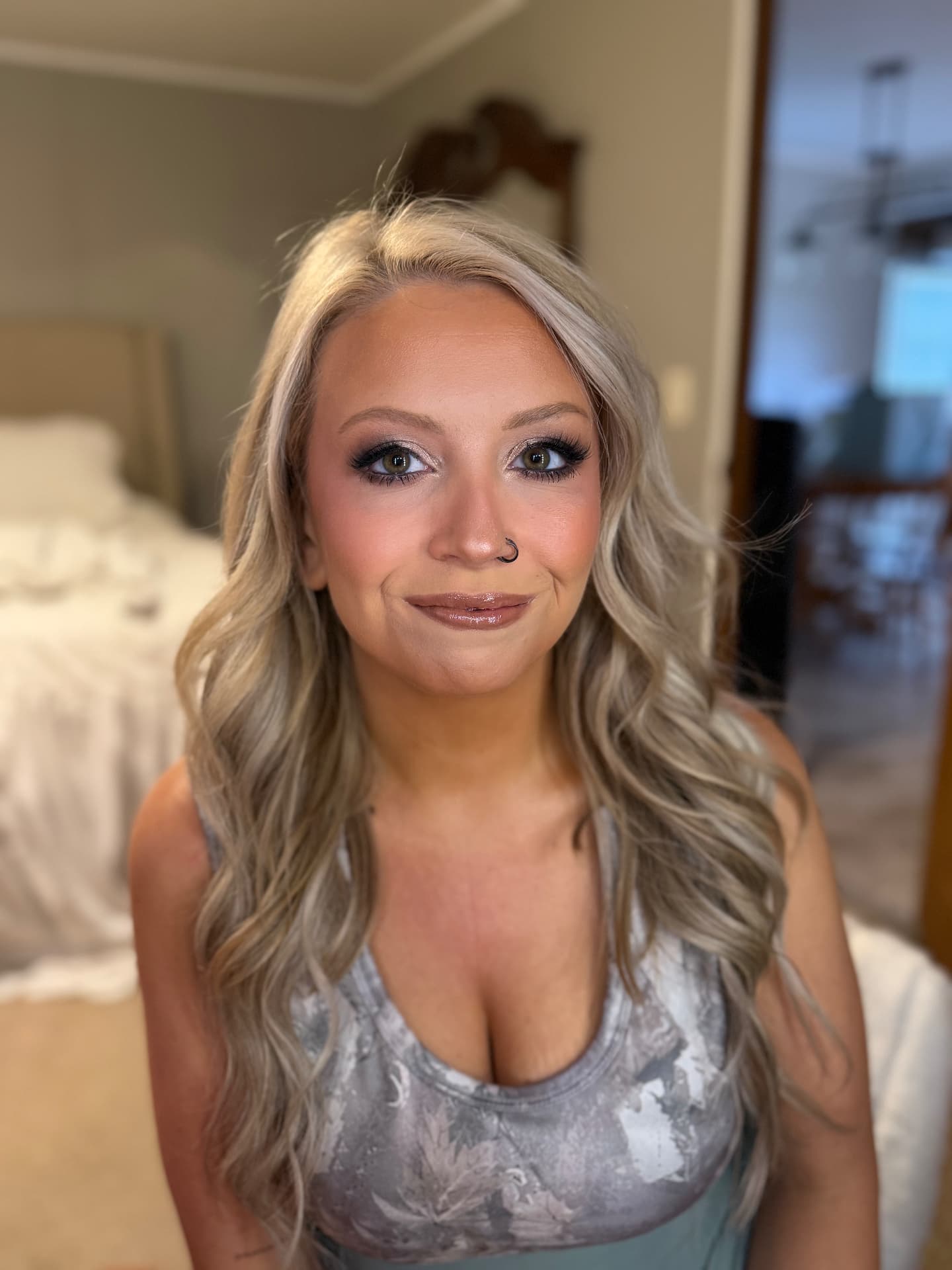 Full glam with mauve smoked eye, glossy nude lip and long lashes